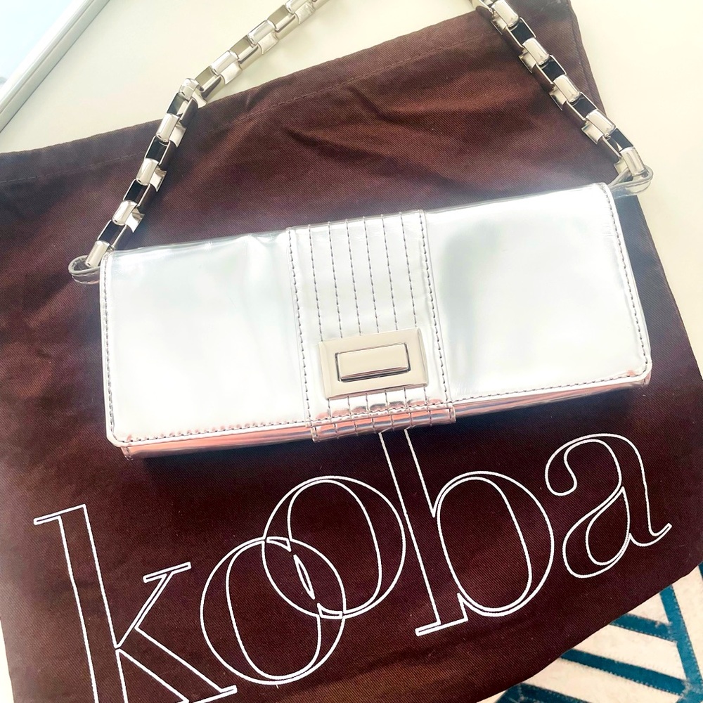 Kooba silver patent leather clutch NWOT